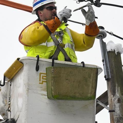 Northeast digs out from winter storm, faces power outages